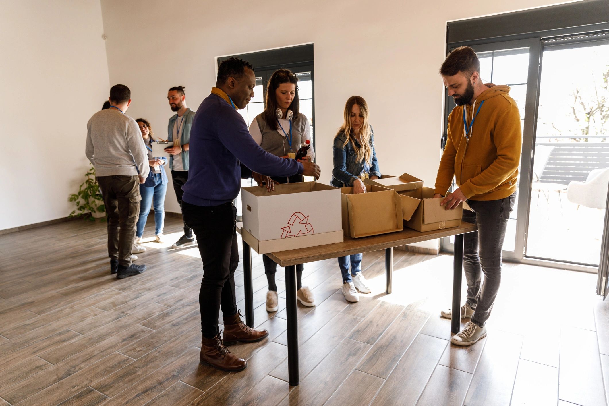 Volunteers organizing donated supplies for community support